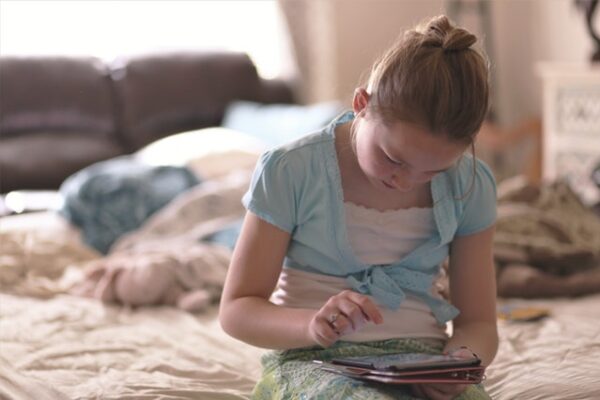 Child playing on tablet